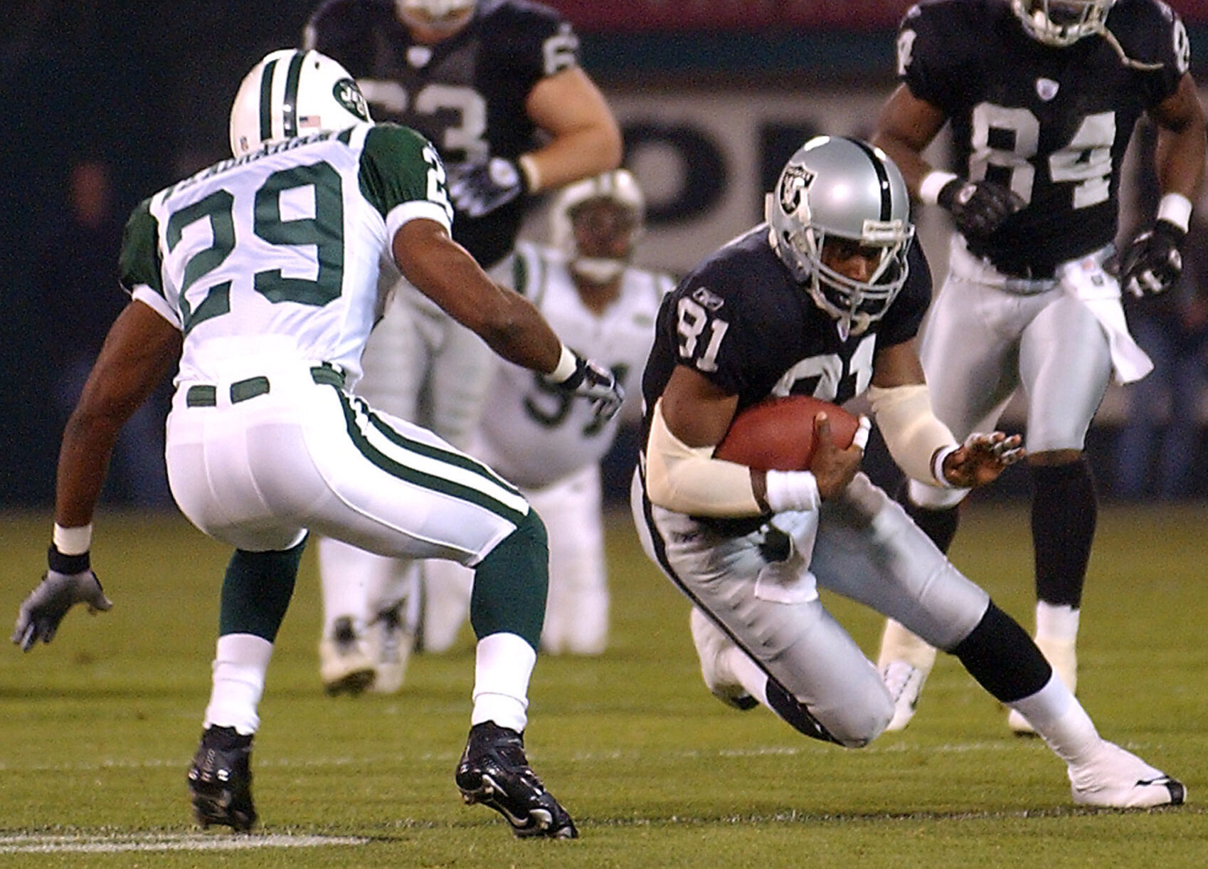 2002: Oakland's Tim Brown, Jerry Rice take turns rewriting NFL record book